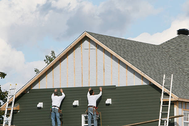 Professional Siding technician working in Covington, GA